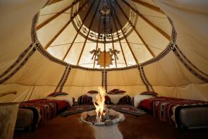 inside the 18ft Nomadics tipi, beautifully decorated 